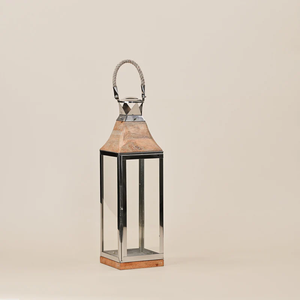 Lanterne en métal artisanale pour la décoration de la maison, offrant un design artistique et une lumière chaleureuse pour des ambiances intérieures chaleureuses - Product Image 1