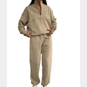 Dernier style de survêtement personnalisé pour femmes vente en gros Vêtements de sport pour femmes 2 pièces Hauts à col roulé avec demi-fermeture éclair Ensemble de pantalons droits et élastiques - Product Image 1