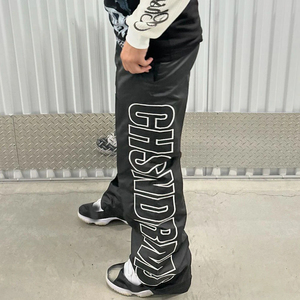 Pantalon baggy en nylon tendance avec ceinture élastique, ceinture réglable, fermeture éclair et bouton, poches, jambe large, couleur noire - Product Image 2