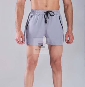 Pantalones cortos de gimnasio para hombre al por mayor, pantalones cortos atléticos con patrón sólido, cintura elástica, pantalones cortos transpirables informales ecológicos con bolsillos para correr - Product Image 4