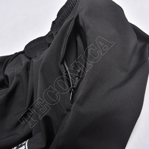 Pantalones de Esquí Negros Reflectantes con Estampado Tribal, Resistentes al Viento, de Alta Calidad, con Forro Interior Cálido, Cintura con Cordón Ajustable y Puños Elásticos - Product Image 4