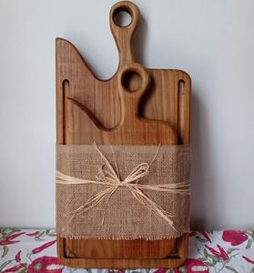 Planche à découper en bois écologique fabriquée à partir de bois durable offrant une surface de coupe sûre et naturelle - Product Image 1