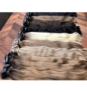 Prix de gros de haute qualité Extensions de cheveux vietnamiens Remy non transformés Belle couleur Vente à chaud Tressage de cheveux bruts de style bouclé - Product Image 1