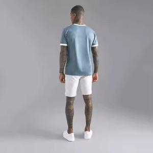 เสื้อยืดคอกลมแขนสั้นผ้าเจอร์ซีย์ผ้าฝ้าย 100% สไตล์วินเทจลำลองสำหรับฤดูร้อน ไม่หดตัว ล้างสีแบบแอซิดพิมพ์ลายพัฟ - Product Image 6