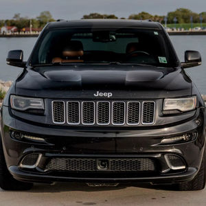 Jeep Grand Cherokee SRT 2014 d'occasion en bon état, 1 propriétaire depuis 2015, moteur Hemi V8 6,4 litres, transmission intégrale, non modifiée - Product Image 1