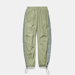 Veste coupe-vent unisexe tendance en nylon, coupe régulière, poches latérales à fermeture éclair, pantalon en nylon ajusté, séchage rapide, bas ample - Product Image 1