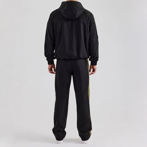 Conjunto de chándal de nailon liso para hombre, chaqueta y pantalones con cremallera de secado rápido transpirable de dos piezas, ropa deportiva informal para gimnasio o ropa de calle - Product Image 3