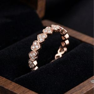 Anillo de diamantes con forma de corazón infinito hecho en oro rosa de 14 quilates para mujer - Product Image 1