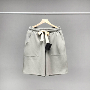 Pantalones cortos de entrenamiento con estampado sólido para hombre, pantalones cortos deportivos de secado rápido para gimnasio con decoración de encaje, ropa para correr - Product Image 3