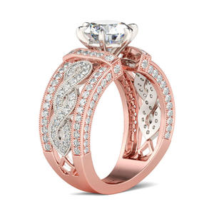 Jeulia <b>Two</b> Tone Twist Round Cut Sterling Silver Trendy <b>Ring</b> - Product Image 3