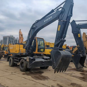 Excavatrice sur pneus Volvo EW170 d'occasion, modèle 2015, moteur Cummins et pompe Volvo, poids en ordre de marche, peinture originale, bonne condition - Product Image 1