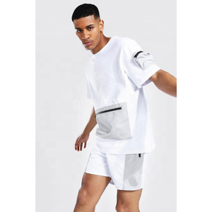 2025 recién llegados camiseta informal de verano Pantalones cortos de dos piezas estampado hombres conjuntos cortos bolsillo de contraste cremallera 100% algodón conjunto de 2 piezas - Product Image 1