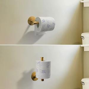 Porte-papier toilette en métal doré brillant, affichant une qualité de fabrication remarquable que les utilisateurs remarquent instantanément. - Product Image 5