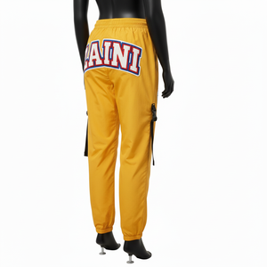 Pantalones Cortavientos para Mujer, Premium, Ligeros, 120 GSM, Tela de Nailon y Poliéster, Color Amarillo, Logotipo Bordado Personalizado - Product Image 5