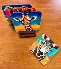 Agregue un toque de encanto de vida silvestre a su espacio con posavasos de animales de colores brillantes con elefante, León, cebra y jirafa - Product Image 5