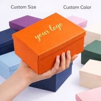 Boîte cadeau rigide orange pliable avec couvercle découpé sur mesure, logo imprimé, garnissage en papier déchiqueté, pour les fêtes et les anniversaires, vente en gros