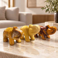 Sculpture d'éléphant en calcite jaune, figurine d'animal en pierre précieuse dorée polie avec de magnifiques motifs pour la décoration intérieure et les cadeaux