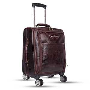 Maleta con ruedas de cuero genuino Unisex de nuevo diseñador, bolsas de equipaje impermeables para la noche con ruedas de bolsa de viaje multiusos hechas a mano - Product Image 1