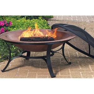 Durable <b>round</b> iron <b>fire</b> <b>pit</b> with natural patina finished perfect for outdoor garden heating and family gatherings - Product Image 6