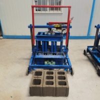 Petite machine portable de fabrication de briques creuses pour usage domestique, très demandée au Nigeria