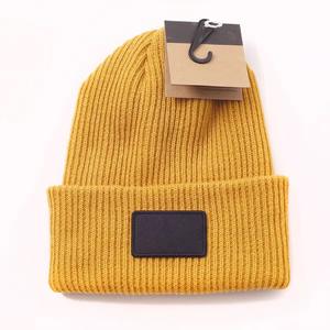 หมวกบีนนี่แบบสวมหัวอบอุ่นสำหรับผู้ชายและผู้หญิงหมวกถักคอตตอน100% สำหรับฤดูหนาวโลโก้ออกแบบได้ตามต้องการ - Product Image 4