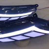 Kit de feux avant à LED bicolores modifiés JC pour Mitsubishi Xpander, avec feux de jour blancs et clignotants ambrés.