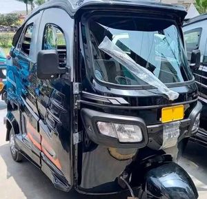 รถสามล้อไฟฟ้าสำหรับผู้โดยสาร 48V 501-800W แบบเปิดประทุน 3 ที่นั่ง โครงเหล็ก ได้รับการรับรองมาตรฐาน DOT สีดำ หลังคาสีเหลือง ความเร็ว 80 กม./ชม. ระยะทางวิ่ง 70-90 กม. - Product Image 1