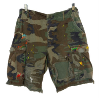 Shorts en jean cargo camouflage déchirés et imprimés sur toute la surface, style utilitaire personnalisé par le fabricant, pour hommes