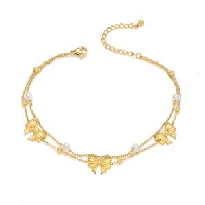 Tobilleras de Moda con Diseño Exclusivo Recién Desarrollado, Chapadas en Oro, de Acero de Titanio, con Lazo y Perla - Product Image 1
