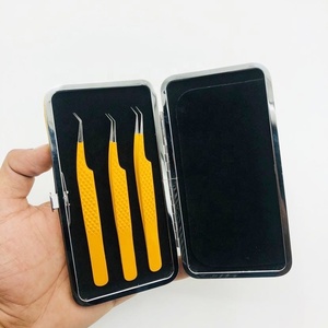 Pinzas para pestañas Etiqueta privada a granel en stock Pinzas para pestañas con volumen de agarre de diamante de acero inoxidable sólido de Color naranja de 45 grados - Product Image 1