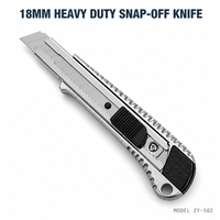 Cutter robuste 18 mm à lame cassable en acier à haute teneur en carbone, manche en alliage d'aluminium et TPE, logo personnalisé OEM