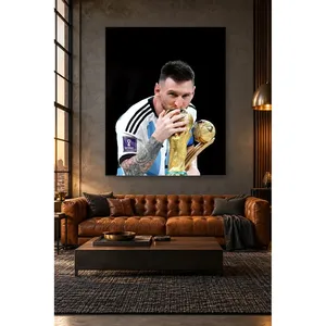 Fida Messi embrassant le trophée sur fond noir, impression sur toile - Product Image 5
