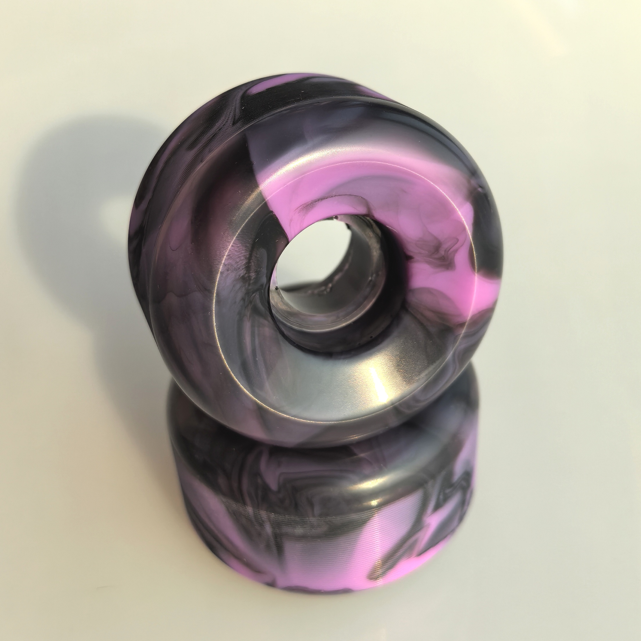 Purple/Black Swirl 56mm