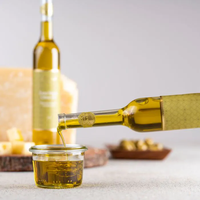 Bouteilles d'huile d'olive en verre miniatures personnalisées 500 ml/100 ml Distributeur d'huile d'olive pour le lait et les gâteaux 100% recyclable