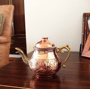 Handcrafted <b>vintage</b> copper <b>kettle</b> with wooden handle and classic spout design perfect for rustic farmhouse kitchen decor - Product Image 1