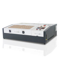 Machine de gravure et de découpe laser CO2 mini JX-4040 - CNC refroidi par eau avec prise en charge DXF/LAS pour le caoutchouc, le bois et le papier