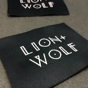 Étiquettes de vêtements en satin tissé en polyester personnalisées de haute qualité pour vêtements chaussures et sacs-fin pli couleur et logo personnalisés en gros - Product Image 6