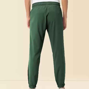 Pantalon de survêtement vert en polyester pour homme, taille élastique, poches latérales, décontracté, léger, idéal pour le printemps - Product Image 2