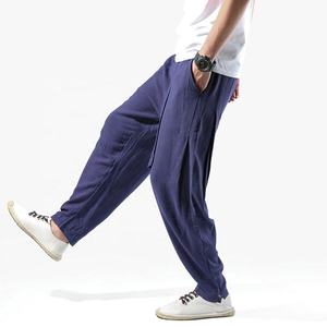 กางเกงลำลองทรงหลวมสำหรับผู้ชายกางเกงวิ่งฟิตเนสเอวยางยืดสีพื้นสำหรับผู้ชาย - Product Image 1