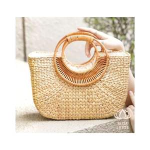 Sac à main en jacinthe d'eau cylindrique bleu lotus du Vietnam fait à la main, prêt à être expédié, vente en gros - Product Image 1