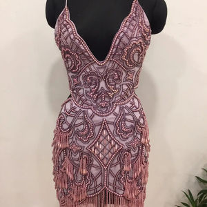 ชุดราตรีฤดูร้อนแบบแขนสั้นยาวระดับเข่า ดีไซน์หรูหราสวยงามจาก Chandni Export ประดับด้วยพู่ คอเสื้อแบบสกูป ตกแต่งด้วยลูกปัดเย็บมืออย่างประณีต - Product Image 1