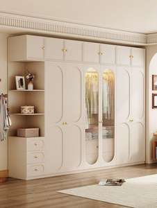 Armoire de luxe vert pastel avec des poignées élégantes et un design de rangement spacieux pour une chambre à coucher élégante - Product Image 5