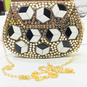 Ornate brass clutch with mosaic patterns and intricate gold details Available Wholesale Stock Garden Ornaments - Product Image 2