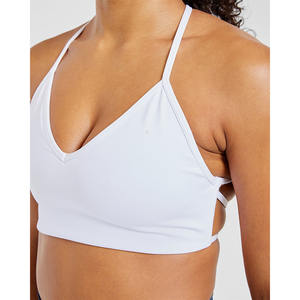 Soutien-gorge de sport croisé blanc avec logo personnalisé flatteur décolleté en V dos à bretelles nouveau et à fort impact soutien-gorge de sport Fitness pour femmes adultes - Product Image 1