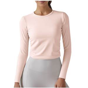 2025 Camiseta de manga larga elástica suave para mujer, camisetas cortas de Color sólido con cuello redondo, camiseta de entrenamiento de Yoga ajustada, estilo Fitness - Product Image 1