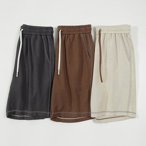 Alta calidad 75% algodón 25% poliéster verano ajuste relajado contraste sólido Top-Costura hasta la rodilla Casual Bermudas para hombres - Product Image 6