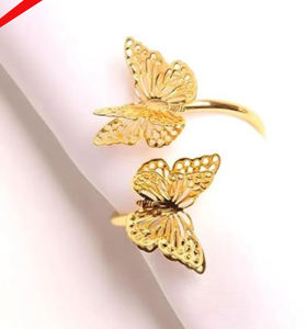 Servilletero de metal con acabado dorado y diseño de mariposa para hotel y restaurante - Product Image 1