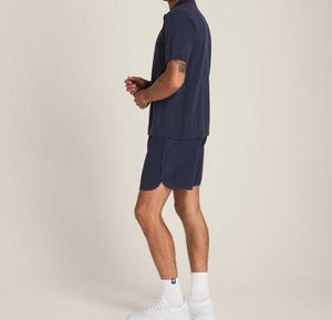 Pantalones cortos de tenis informales sólidos ecológicos de poliéster 100% de alta calidad OEM para hombres y mujeres con nombre y logotipo de equipo personalizados - Product Image 2