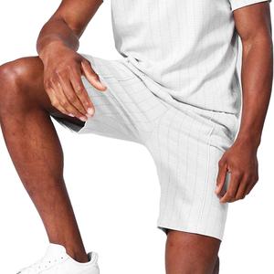 Conjunto de ropa de invierno de dos piezas para hombre, ligero, transpirable, con logotipo personalizado, estampado sólido, pantalones cortos, camiseta ecológica cálida - Product Image 1