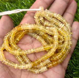 Cuentas espaciadoras Heishi con forma de neumático de 5mm de ópalo amarillo natural, cuentas de piedra - Product Image 1